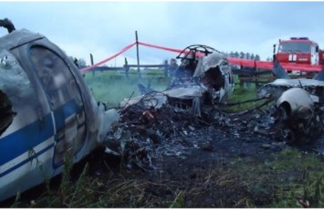 Под Красноярском нашли "черные ящики" разбившегося Ан-24